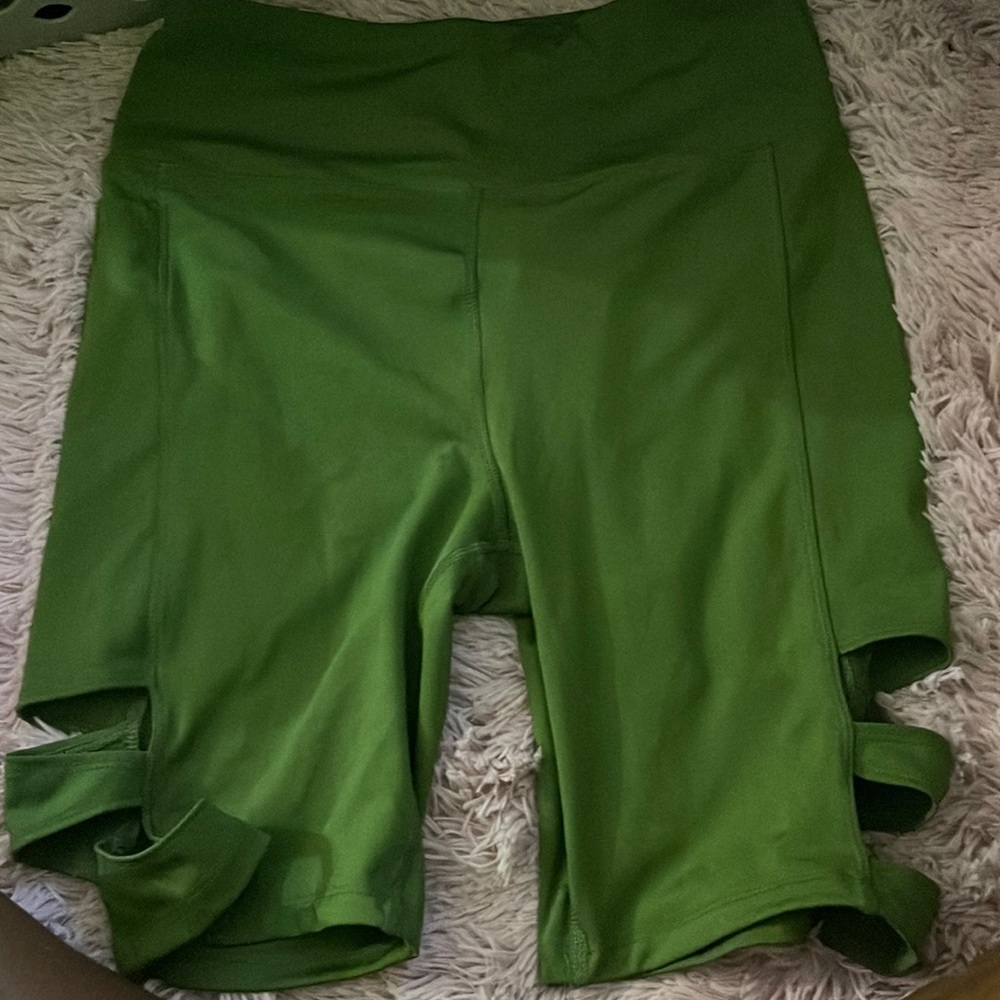Green athletic biker shorts
